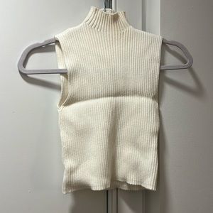 Zara white sleeveless mockneck sweater. Snug fit. Crease in pic due to folding